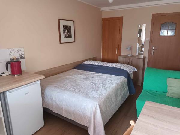 Pokoje i Apartamenty u Kryni