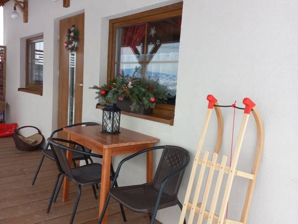 Sanki- na wyposażeniu domku