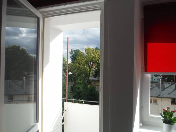 Apartament 1 Słoneczny balkon w pokoju dziennym