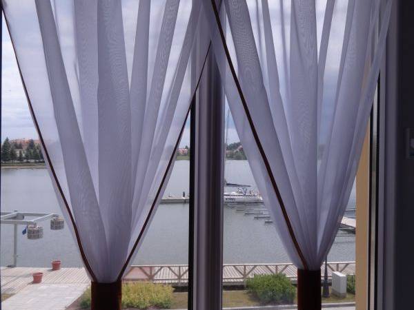 pokoje gościnne nad jeziorem w Rynie